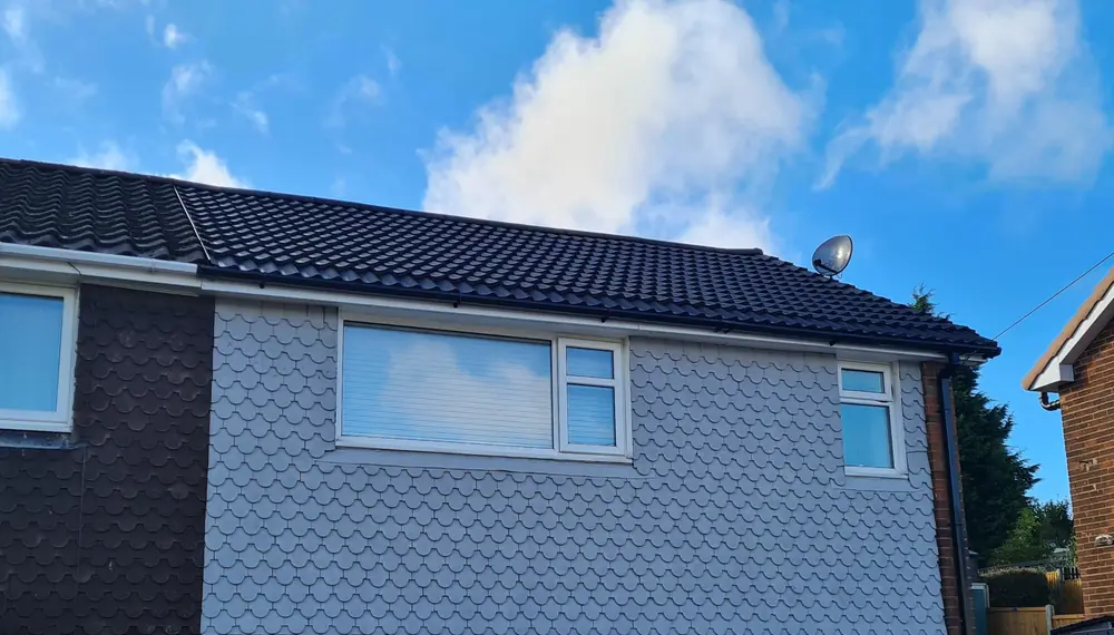 A finished re-roof on a semi-detached house