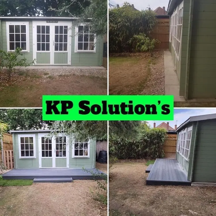 Grey composite decking in front of a summer house