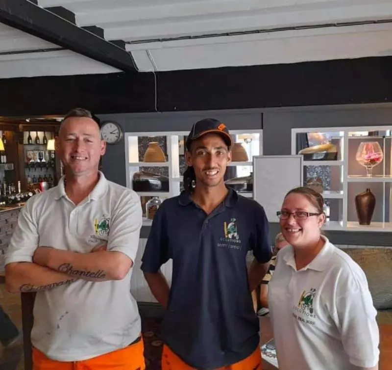 Paul, Barry and Charmaine from KP Solutions in their work shirts